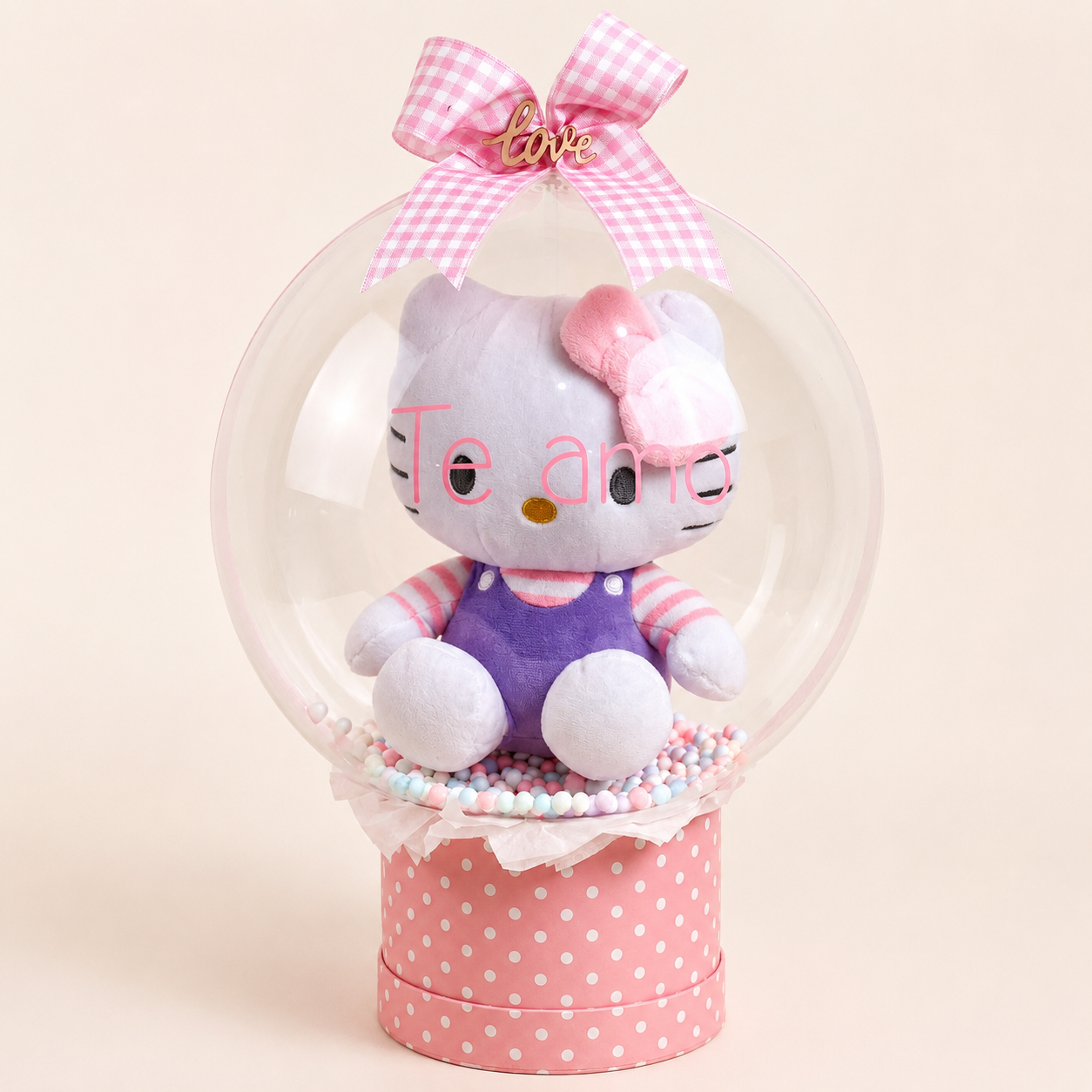 Glow Collection con peluche de Hello Kitty rosa en globo burbuja personalizado