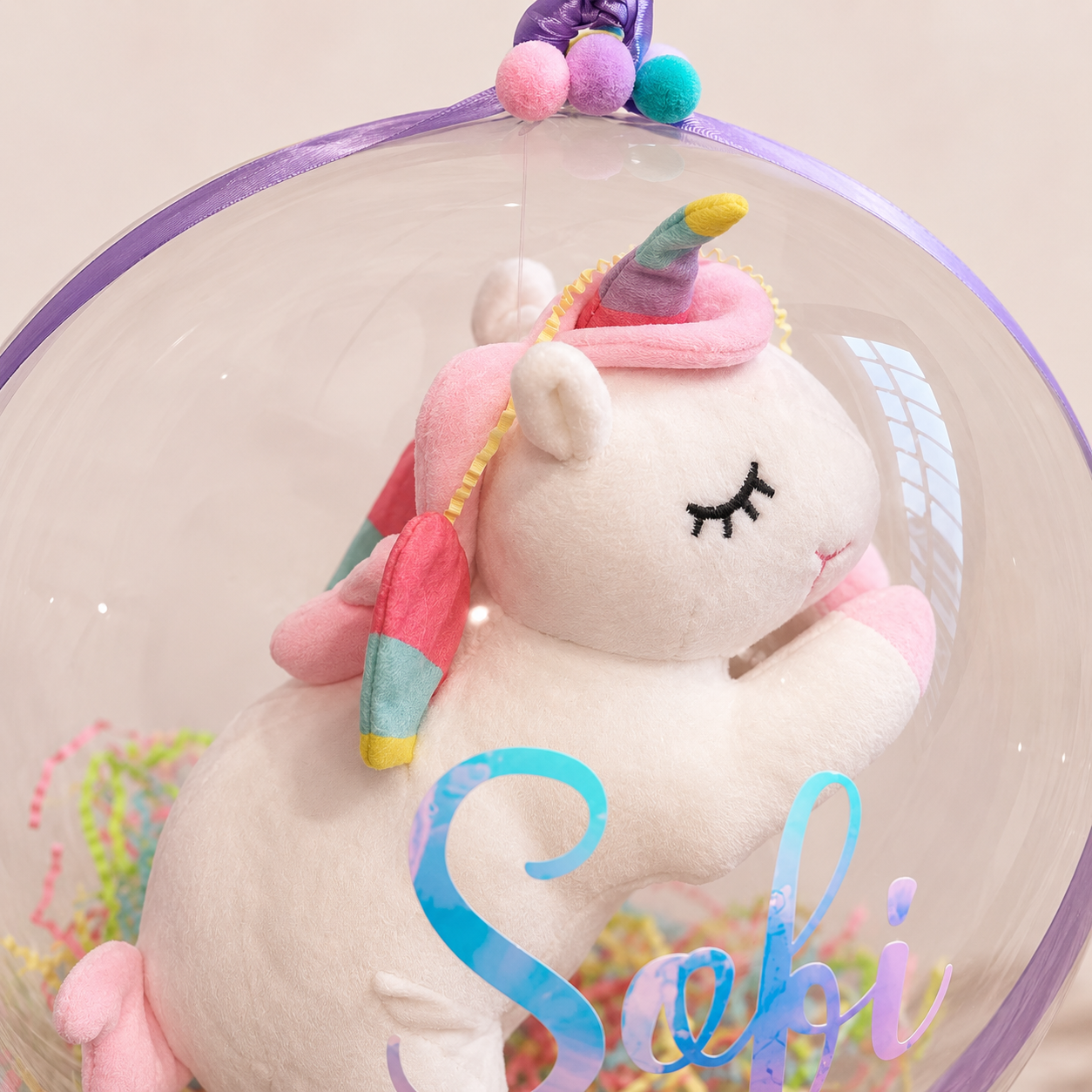 Detalle del unicornio de peluche en The Floats Air personalizado